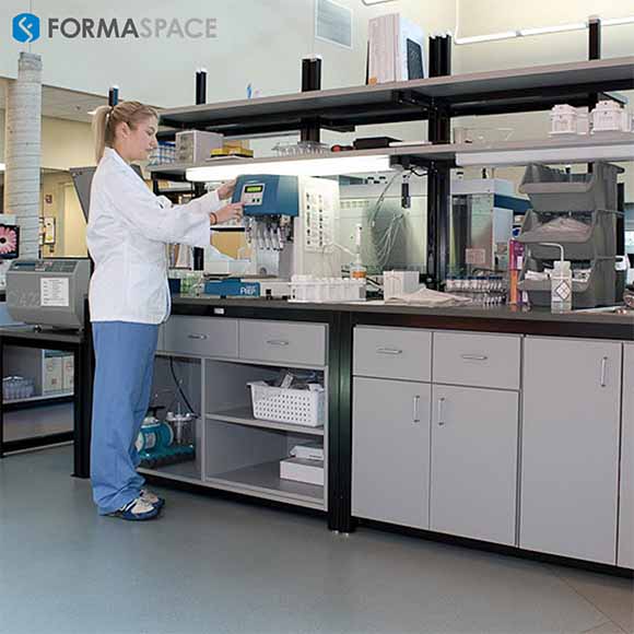 hematologist testing at lab bench