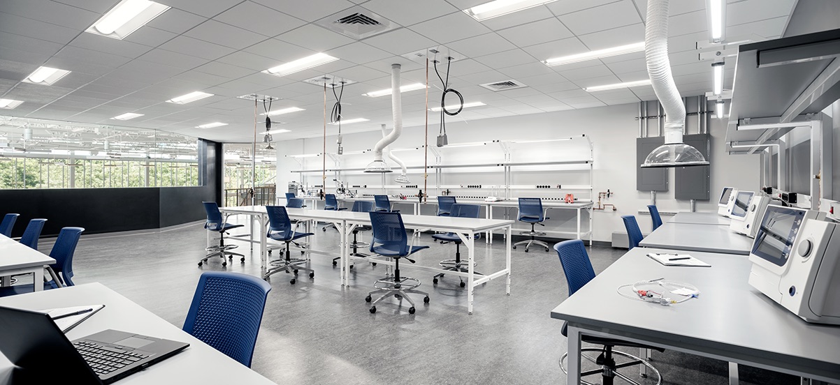spacious laboratory with workbenches and countertops