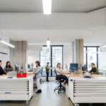 Engineering workspace with mobile tool cabinets and workstations